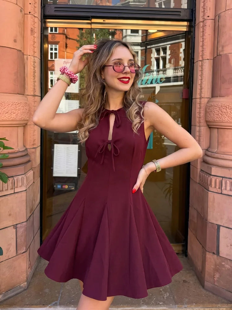 Women’s Elegant Sleeveless Mini Dress – Chic Bow Detail, Modern Cutout Design, Wine Red Summer Dress for Date Nights, Festivals & Casual Outings