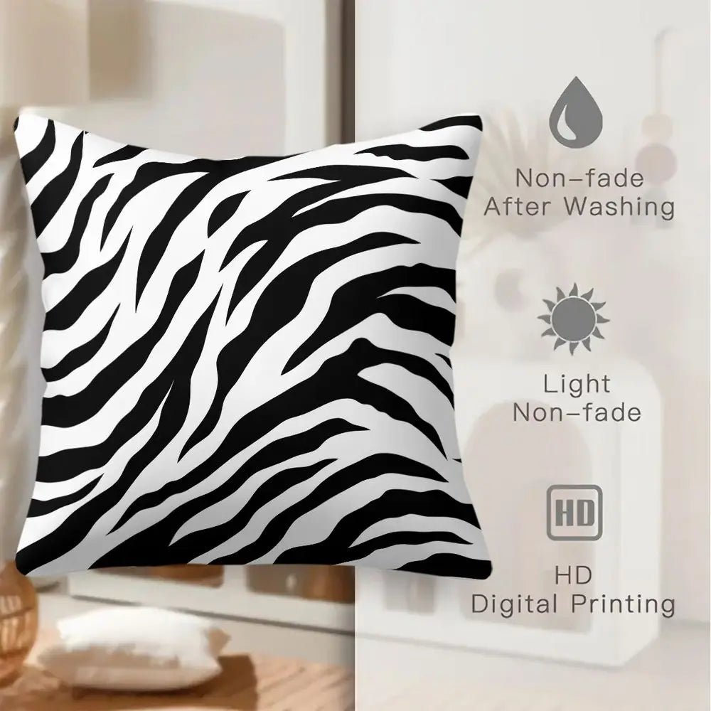 Black and white zebra print throw pillow on a modern sofa