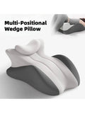 Memory foam wedge pillow with removable cover on a bed for comfortable sleeping and relaxing