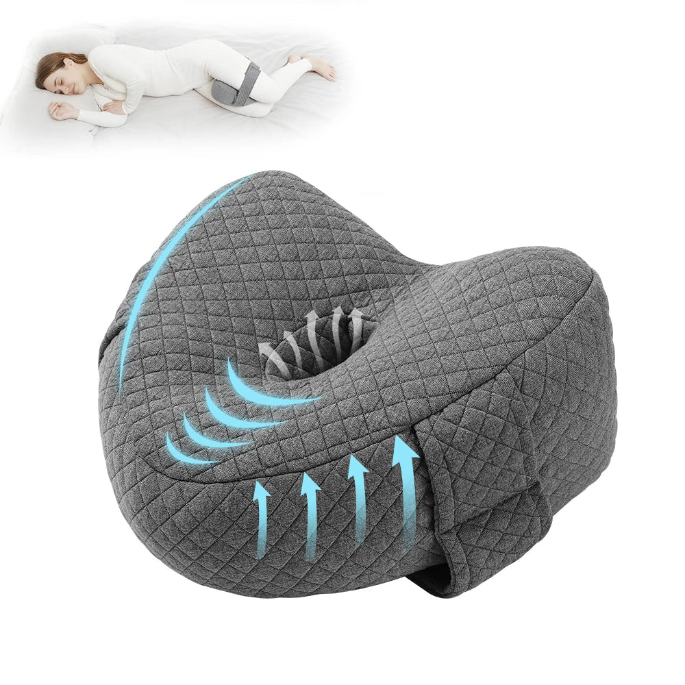 Memory foam orthopedic knee pillow placed between the legs of a side sleeper