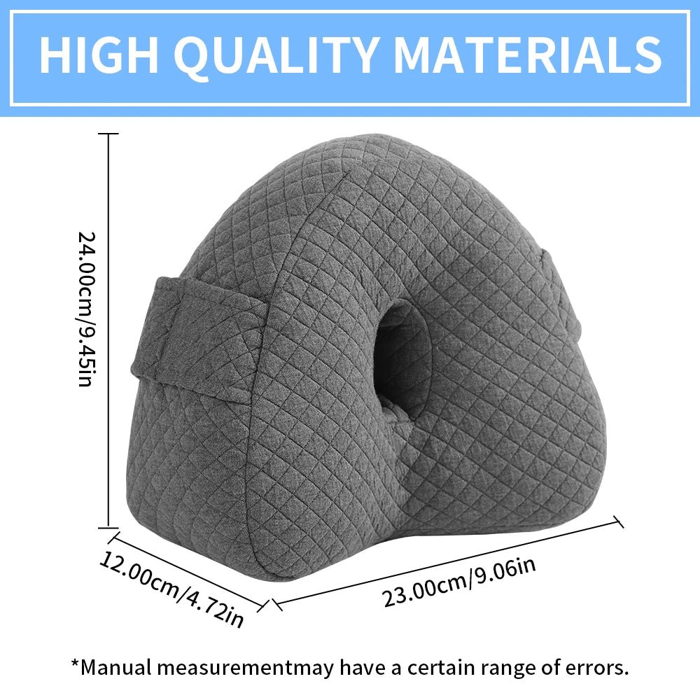 Memory foam orthopedic knee pillow placed between the legs of a side sleeper
