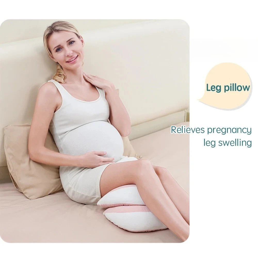 Full-body pregnancy pillow with free waist support pillow on a bed