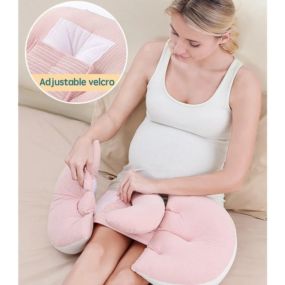 Full-body pregnancy pillow with free waist support pillow on a bed