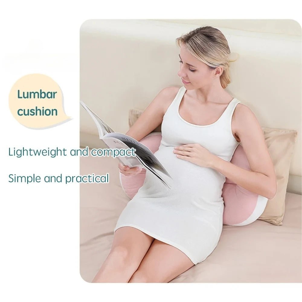 Full-body pregnancy pillow with free waist support pillow on a bed